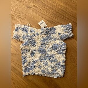 Free People tap size small and white and blue crop top